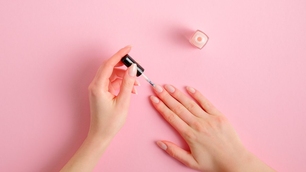Woman,Applying,Polish,On,Nails,At,Home.,Female,Hands,With